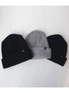 black and white photo of homme femme beanies